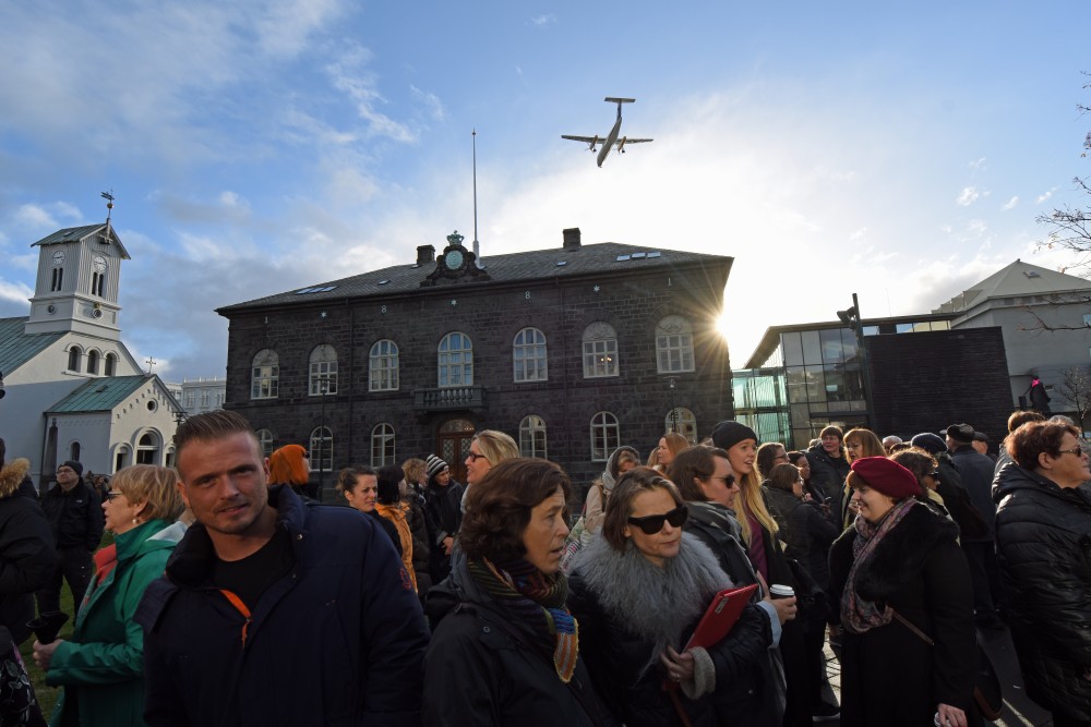 One in five Icelanders say they will vote for the Pirate Party. Here, people in front of the Parliament building in Reykjavik on Monday. (Thomas Nilsen/The Independent Barents Observer)