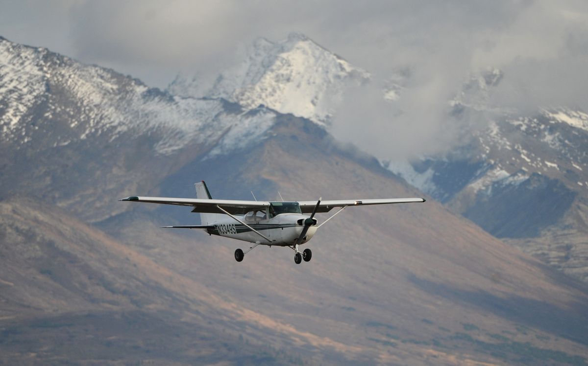 Land and Sea Aviation Alaska flight instructor Andrew Nelson and student pilot Cole Harkovitch make an approach to Runway 25 while doing touch and gos at Merrill Field on Oct. 3, 2016. (Bill Roth / Alaska Dispatch News)