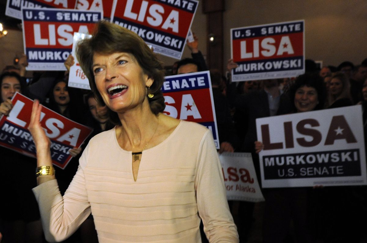 Sen. Lisa Murkowski celebrates with supporters at the 49th State Brewing Co. in Anchorage on election night. (Bill Roth / Alaska Dispatch News)