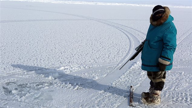 Isuaqtuq Ikkidluak out on the seal ice while seal hunting. (Alethea Arnaquq-Baril)