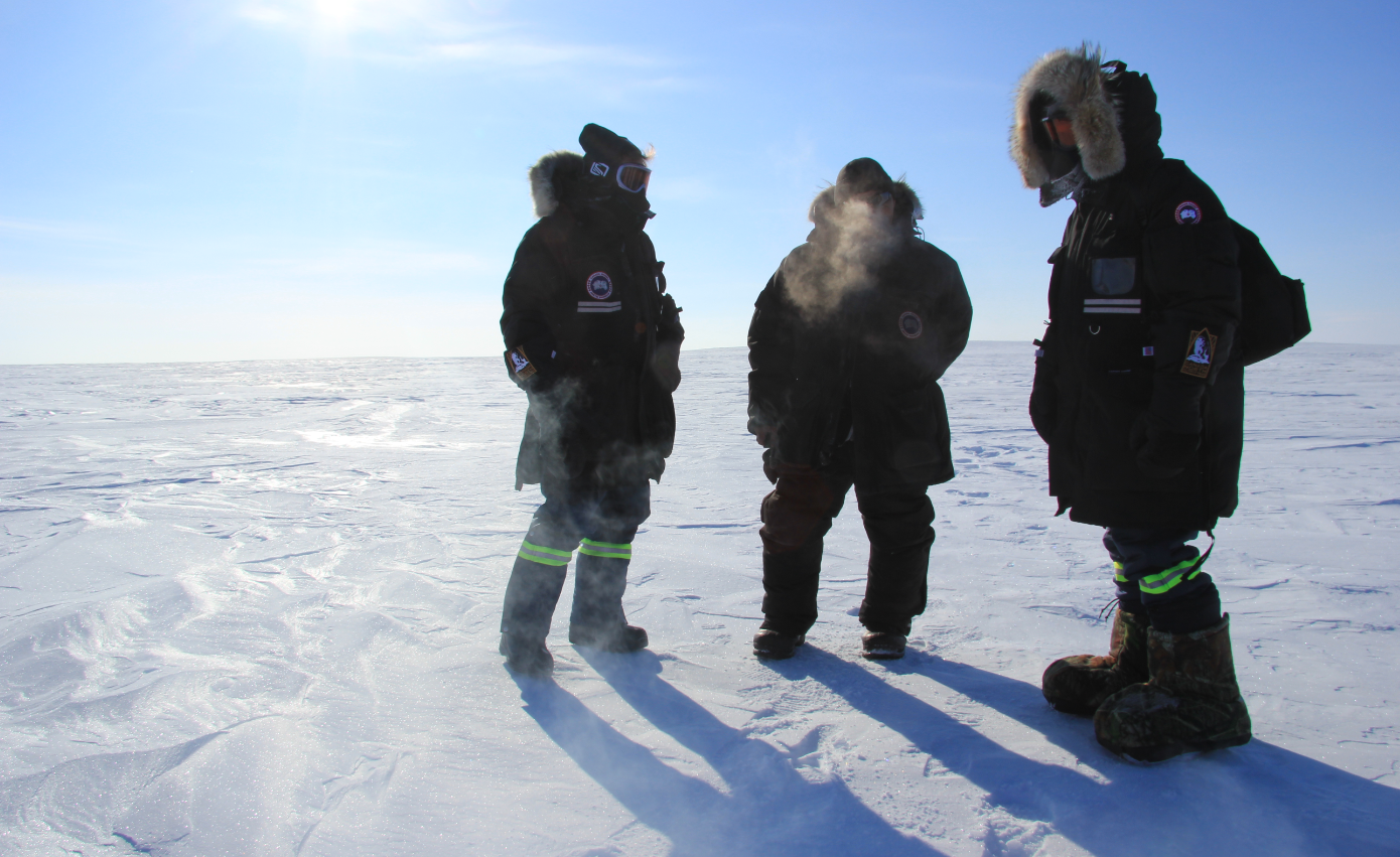 Out on the land in Canada's High Arctic. From left to right: University of Calgary professor Susan Kutz, Cambridge Bay hunter Colin Amegainek, University of Calgary PhD student Juliette Di Francesco. Partnerships between indigenous knowledge and science are increasingly important to understanding Arctic climate change. (Eilís Quinn/Eye on the Arctic)