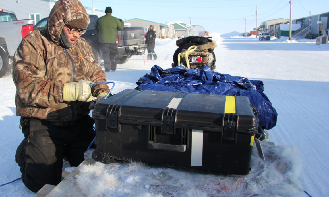 Roland Emingak gets ready for a day out on the land. Hunters like him are noticing increasing changes in the Arctic environment. (Eilís Quinn/Eye on the Arctic)