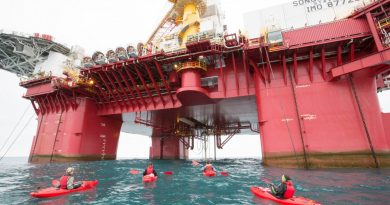 norwegian-coast-guard-tows-arctic-sunrise-to-tromso-1