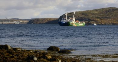 norwegian-coast-guard-tows-arctic-sunrise-to-tromso