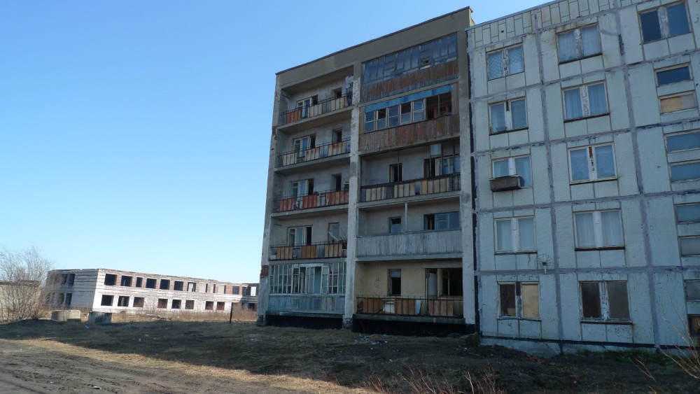 Abandoned apartment blocks close to the air-field. (Thomas Nilsen/The Independent Barents Observer)