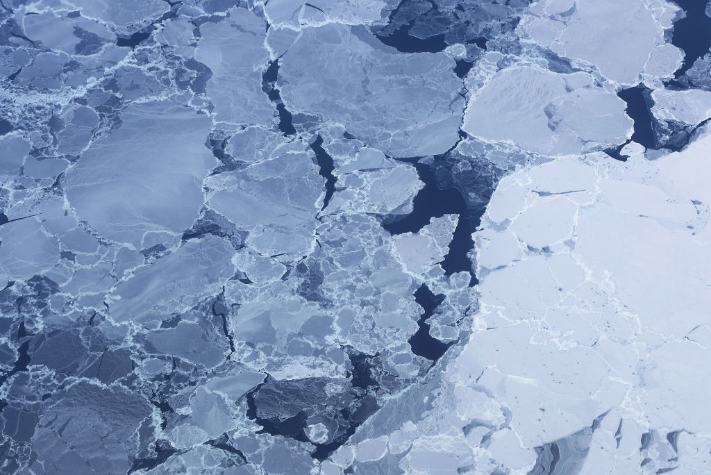 ELLESMERE ISLAND, CANADA - MARCH 29: Sea ice is seen from NASA's Operation IceBridge research aircraft on March 29, 2017 above Ellesmere Island, Canada. The ice fields of Ellesmere Island are retreating due to warming temperatures. NASA's Operation IceBridge has been studying how polar ice has evolved over the past nine years and is currently flying a set of eight-hour research flights over ice sheets and the Arctic Ocean to monitor Arctic ice loss aboard a retrofitted 1966 Lockheed P-3 aircraft. According to NASA scientists and the National Snow and Ice Data Center (NSIDC), sea ice in the Arctic appears to have reached its lowest maximum wintertime extent ever recorded on March 7. Scientists have said the Arctic has been one of the regions hardest hit by climate change.