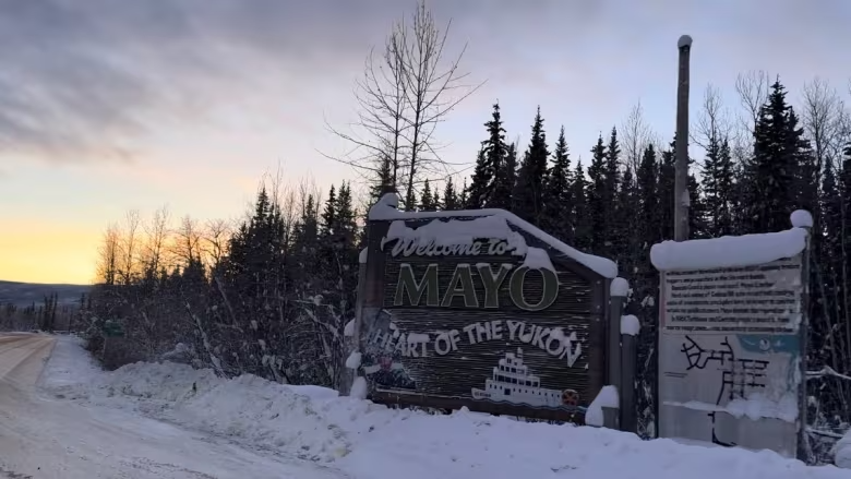 A sign welcomes people to Mayo, Yukon, in February 2023. The First Nation of Na-Cho Nyäk Dun passed a resolution in mid-March declaring a state of emergency related to opioids just days after a double homicide. (Juanita Taylor/CBC)