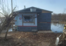 High water levels on the Peel River near Fort McPherson, N.W.T., put cabins at risk
