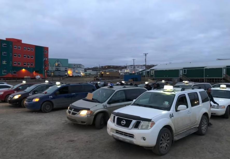 Cars parked one next to another