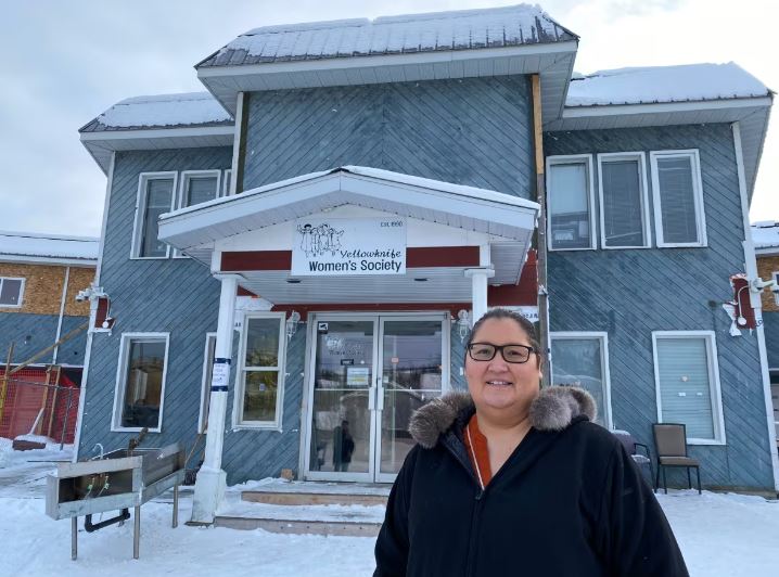 Renee Sanderson stands in front of the Yellowknife Women's Society building