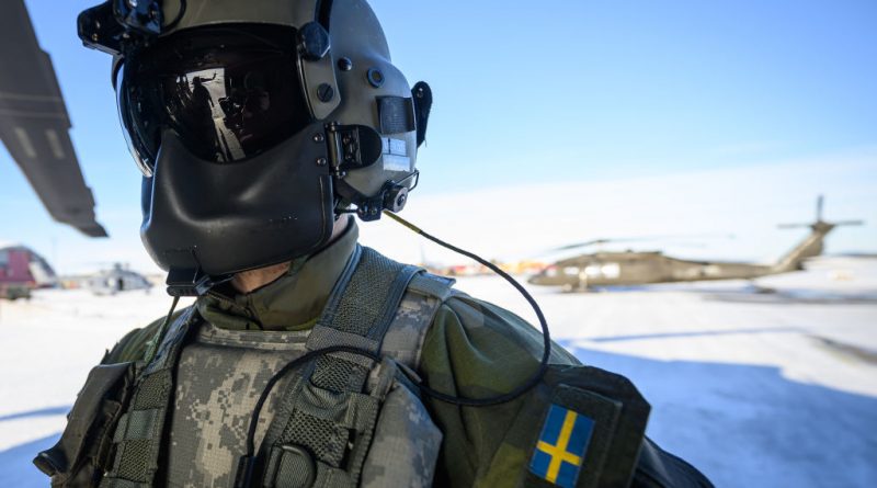 A file photo of a member of the flight crew waiting for his Blackhawk UH-60 helicopter during the Nordic Response military exercise on March 07, 2024 in Kiruna, Sweden.