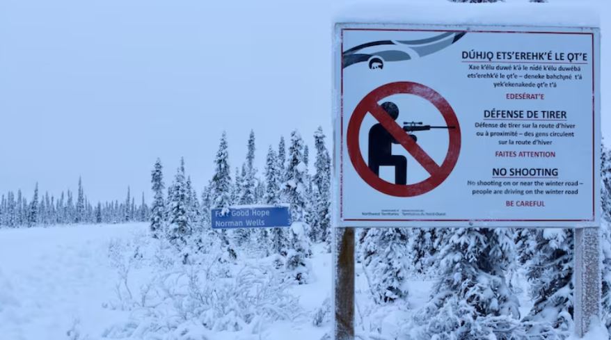 A sign on a winter day.
