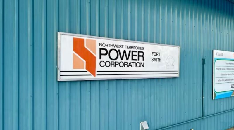 A photo of a Northwest Territories Power Corporation sign on a blue building.
