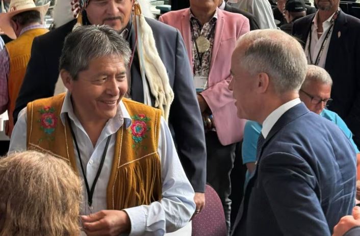 Dene National Chief George Mackenzie and Prime Minister Mark Carney at the summit on C-5, an act that Ottawa passed to expedite approvals for projects in the national interest, a term Mackenzie would like clearly defined.