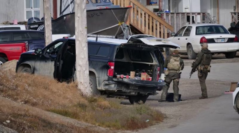 Men with guns and tactical gear stand outside.