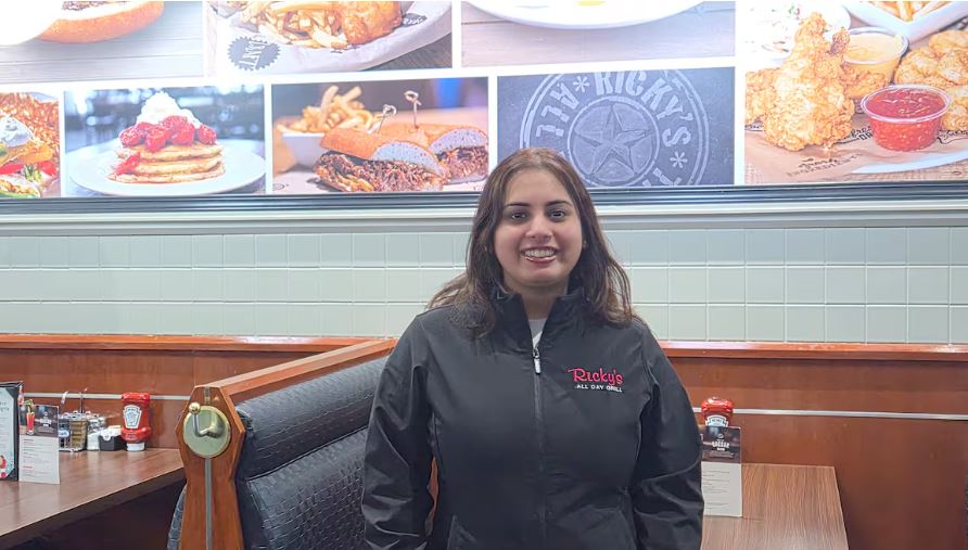 Satwant (Sweets) Kaur Dhillon, Owner of Ricky's Yellowknife stands at the restaurant