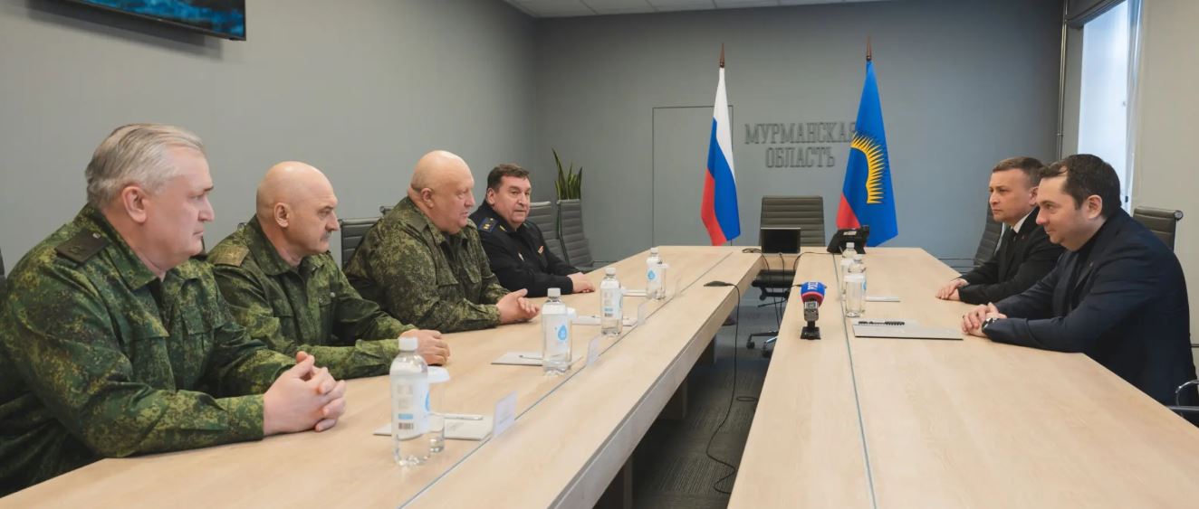 Five men around the table