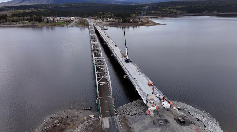Two bridges, one under construction, seen from the air.