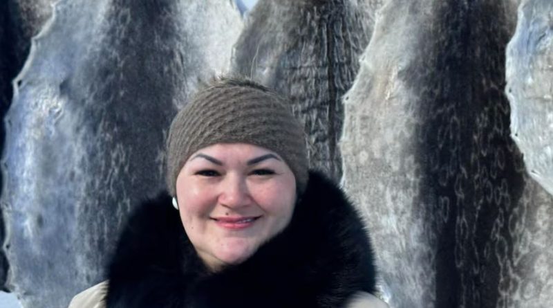 a picture of a woman, gloria, smiling at the camera