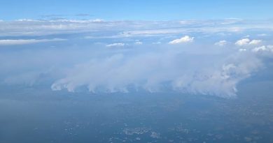 An aerial view of wildfire smoke.