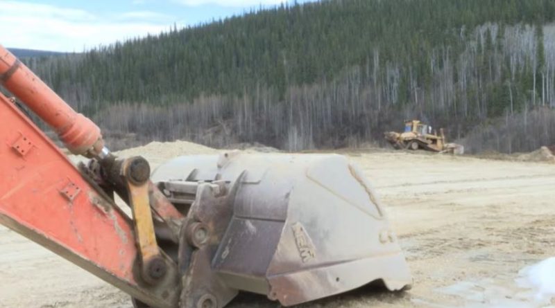 An excavator and a bulldozer
