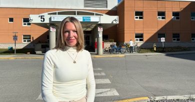 Woman stands outside the Whitehorse General Hospital on June 12, 2026.