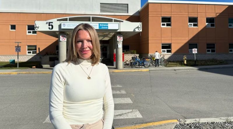 Woman stands outside the Whitehorse General Hospital on June 12, 2026.