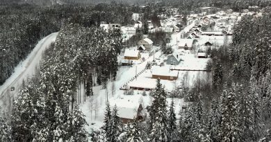 Snow coats the village of Ikhala in Russia’s Karelia region, Tuesday, Feb. 16, 2021. Russia’s rollout of its coronavirus vaccine is only now picking up speed in some of its more remote regions, although experts say the campaign is still moving slowly. (AP Photo/Kirill Zarubin)