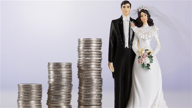 Une noce typique en 2015 au Canada, selon les désirs des fiancés, coûtait au bas mot 31 717 dollars. Il y a à peine trois ans plus tôt, cette estimation était de 27 889 dollars. Photo Credit: IS / iStock