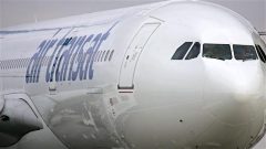 Un avion d’Air Transat. Photo Credit: AFP/Joël Saget