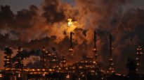 Petro-Canada’s oil refinery glows at dusk in Edmonton
