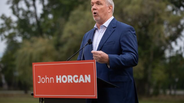 John Horgan, le premier ministre sortant et chef du Nouveau parti démocratique de Colombie-Britannique - Photo : La Presse Canadienne / Darryl Dyck