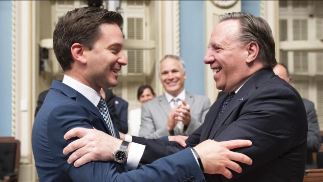 Le Premier ministre du Québec, François Legault et le ministre de l'immigration à l'époque, Simon Jolin-Barrette après l'adoption de la loi sur la laïcité ‎de l'État - 16.06.2019 - La Presse canadienne / Jacques Boissinot