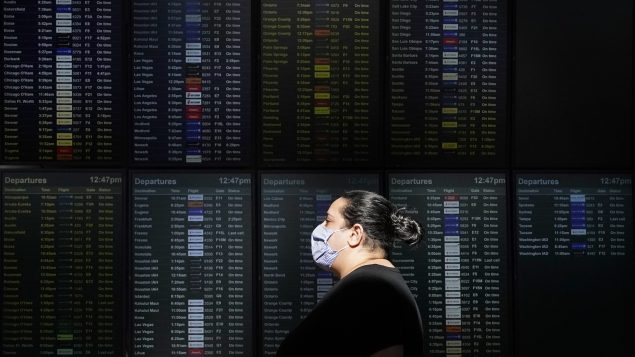 Air Canada dit qu’elle «explore actuellement des options viables aux aéroports canadiens.» pour implanter la reconnaissance faciale à l'embarquement - Photo : AP Photo / Jeff Chiu (Aéroport de San Francisco)