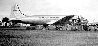 A DC-4 aircraft in the 1950's. The plane sports the colors of Trans-Canada Airlines, Air Canada precursor. (Museum of Aviation and Space in Canada) 