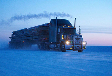 A truck drives on an ice road towards Yellowknife, Northwest Territories. (CP PHOTO / History Channel)