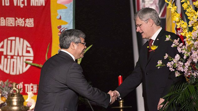 Prime Minister Stephen Harper shakes hands with Vietnamese-Canadian Senator Thanh Hai Ngo during Vietnamese Lunar New Year events in the Toronto area on January 19, 2013. Ngo’s private member’s legislation to commemorate the arrival of refugees sparked a diplomatic spat between Canada and Vietnam. Photo: Aaron Vincent Elkaim/Canadian Press