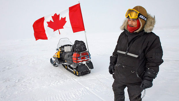 Canadian Ranger Joe Amarualik from Iqaluit stands beside his snowmobile during a sovereignty patrol near Eureka on Ellesmere Island, Nunavut, in 2007. Researchers will set up a world-class astronomical observatory on the island, which has some of the best sky gazing conditions in the world. (Jeff McIntosh/The Canadian Press)