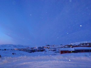 Twilight snowfall in Cape Dorset, Nunavut.