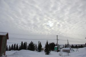 View of Great Bear Lake from Deline, Northwest Terriotires. Most homes have traditional Dene teepees in their yards used for smoking meats and tanning hides.