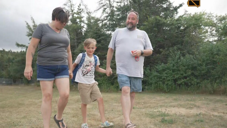 Robyn Dwyer, Scott Chandler et leur fils Rhys.
