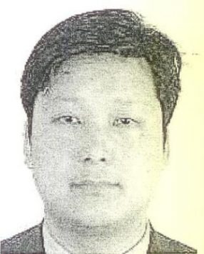 国际刑警组织通缉令上的沈士渊照片