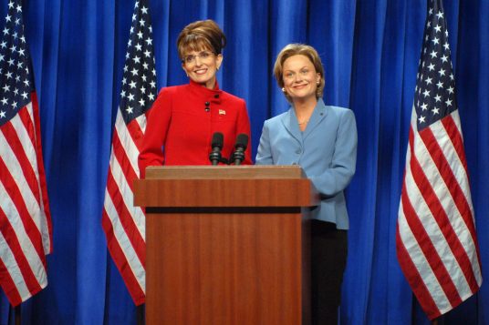 In this Sept. 13, 2008 photo released by NBC, Tina Fey portrays Alaska Gov. Sarah Palin, left, and Amy Poehler as Sen. Hillary Clinton during a skit on "Saturday Night Live," in New York. The long-running sketch comedy series will celebrate their 40th anniversary with a 3-hour special airing Sunday at 8 p.m. EST on NBC. (AP Photo/NBC, Dana Edelson)